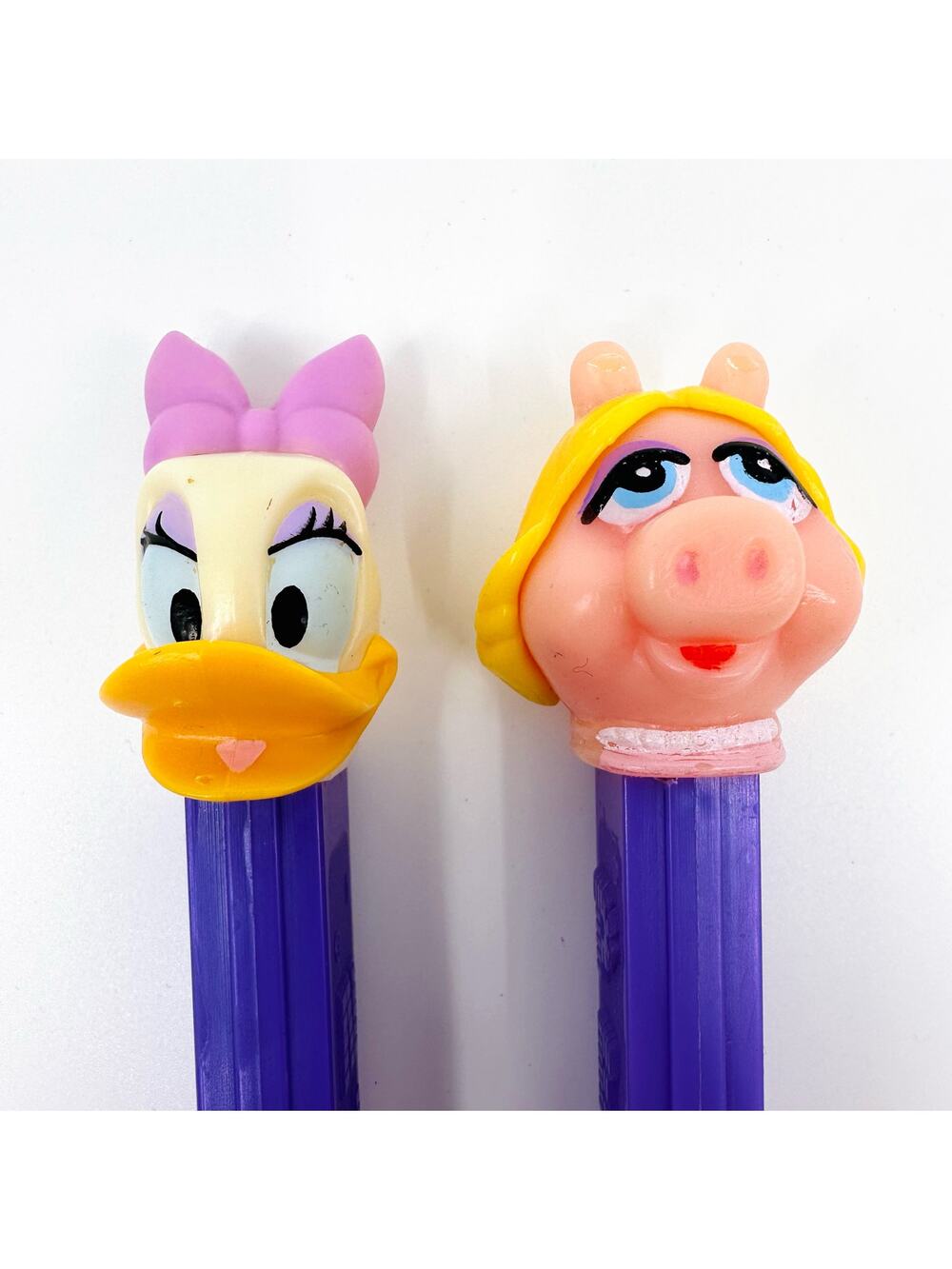Set Of 2 Vintage Pez Candy Dispenser Purple Daisy Duck & Miss Piggy A. Muppets